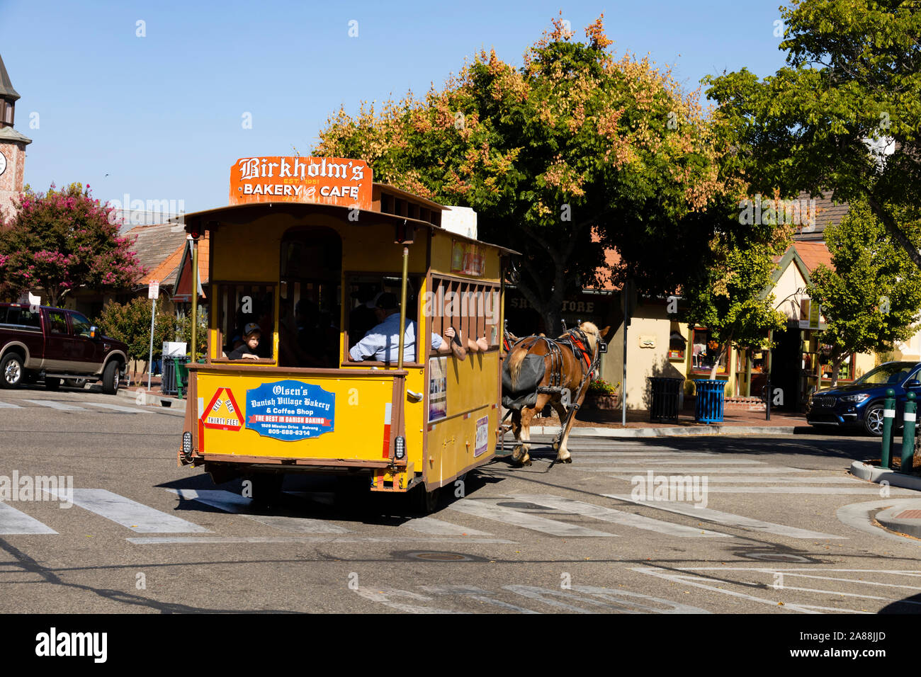 Two horse drawn trolley bus, The Danish settlement of Solvang, Santa Barbara County, California, United States of America. Stock Photo
