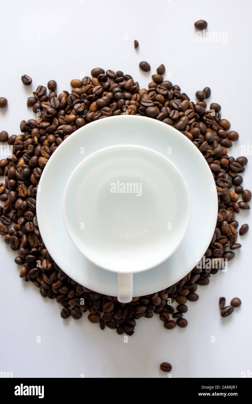 cup of coffee with beans on white background Stock Photo - Alamy