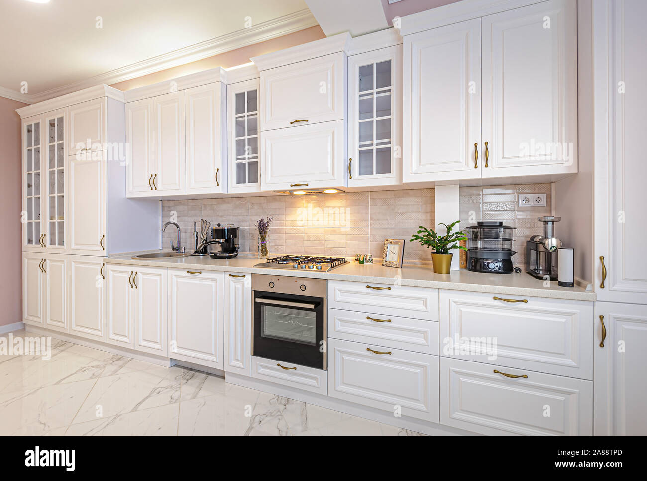 Modern white Kitchen Counter and Kitchen Equipment in Luxurious Apartment.  small kitchen counter ideas in the residential Stock Photo - Alamy