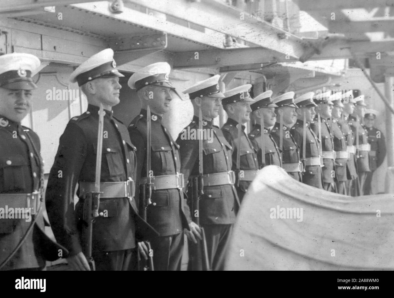 Royal marines guard ww2 HMS Caradoc Stock Photo Alamy
