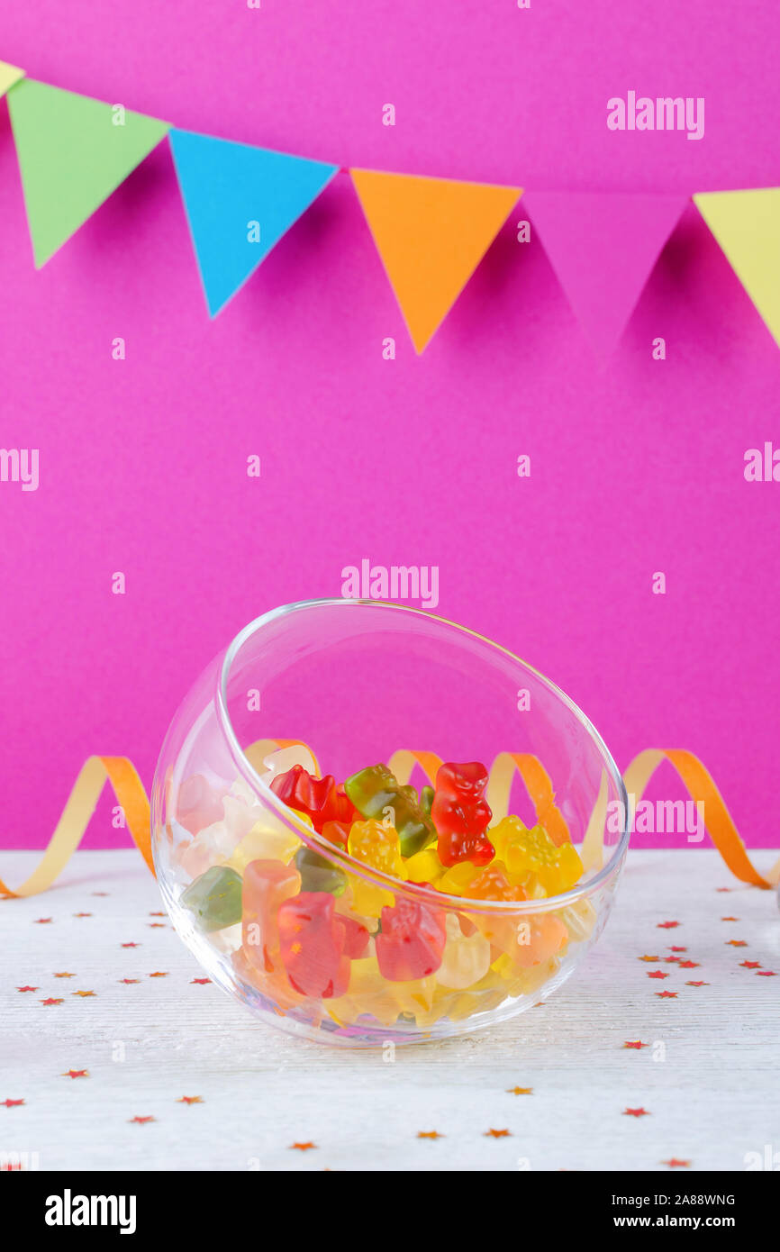 jelly candy in glass bowl on pink party background Stock Photo Alamy