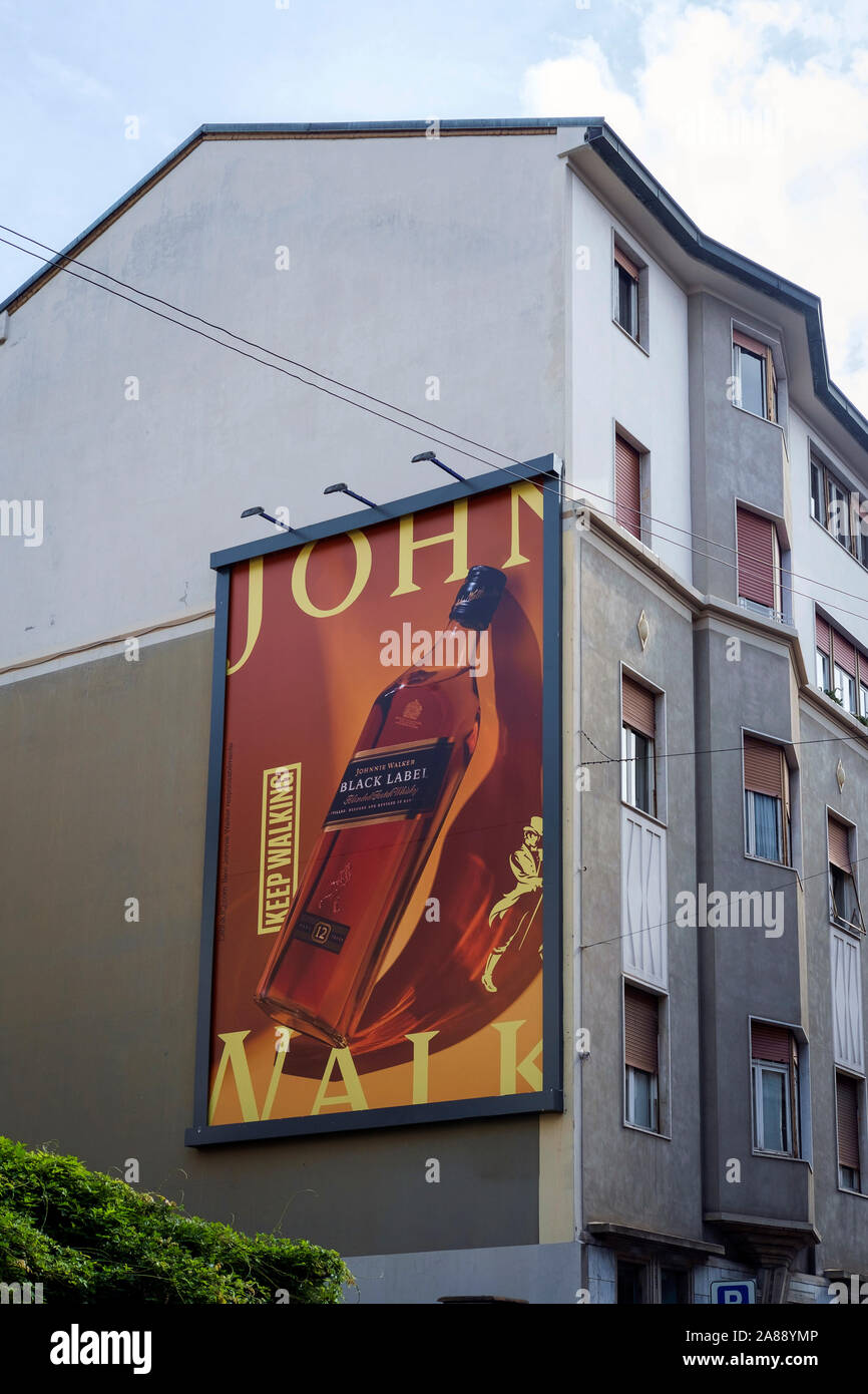 Milano, Italy, October 2019. Johnnie Walker big billboard on a facade of a building. Stock Photo