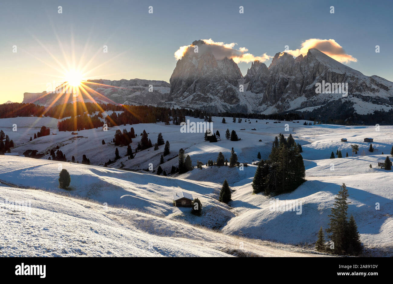 Picturesque sunrise panoramic view on Odle - Geisler mountain group, Seceda and Seiser Alm (Alpe di Siusi). Beautiful morning autumn scenery in the Do Stock Photo