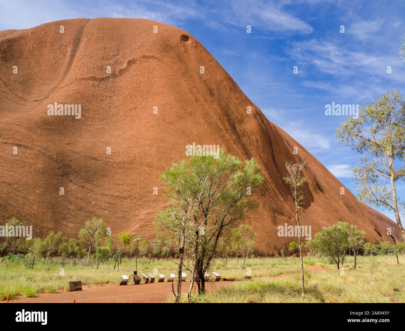 Uluru Or Ayers Rock Is A Massive Sandstone Monolith In The Heart Of 