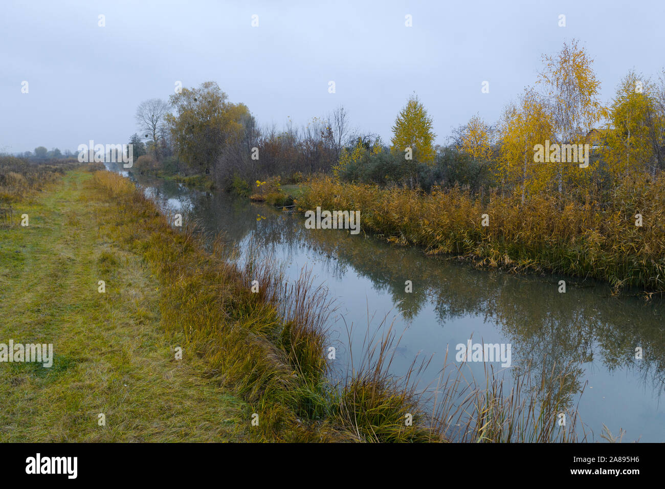 an autumn river at a cloudy day, Ukraine Stock Photo