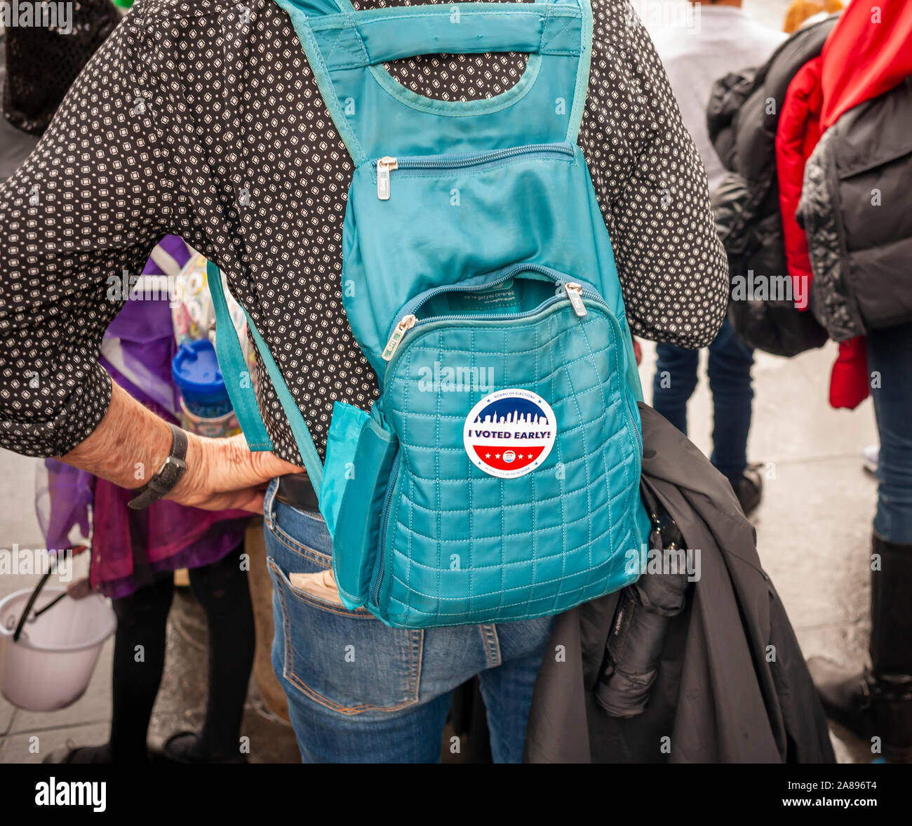 A voter wears her 'I Voted Early” sticker  in New York on  Thursday, October 31, 2019. New York is experimenting with a week of voting early leading up to election day, November 5. (© Richard B. Levine) Stock Photo