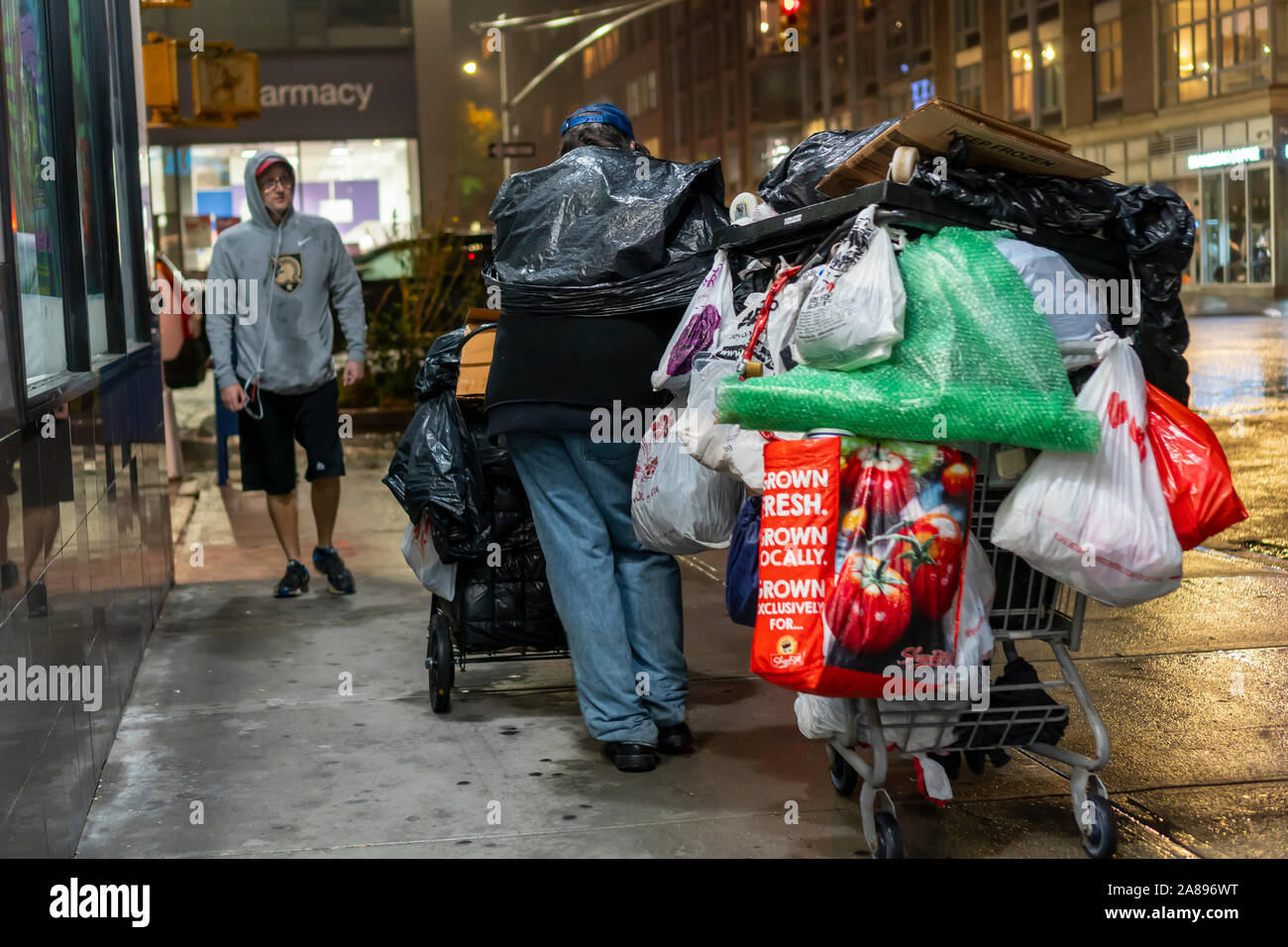 A homeless man with his possessions in the Chelsea neighborhood of New York on Tuesday, October 29, 2019. (© Richard B. Levine) Stock Photo
