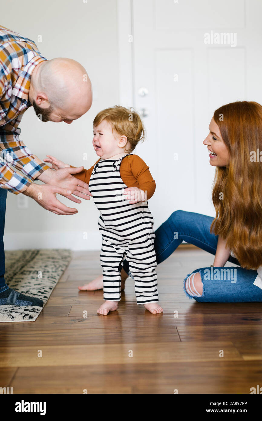 Parents with their crying son Stock Photo