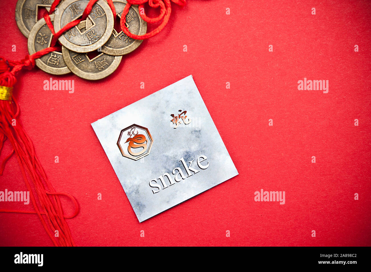 Card With The Symbol Of Chinese Astrological Sign Of Snake Stock Photo 