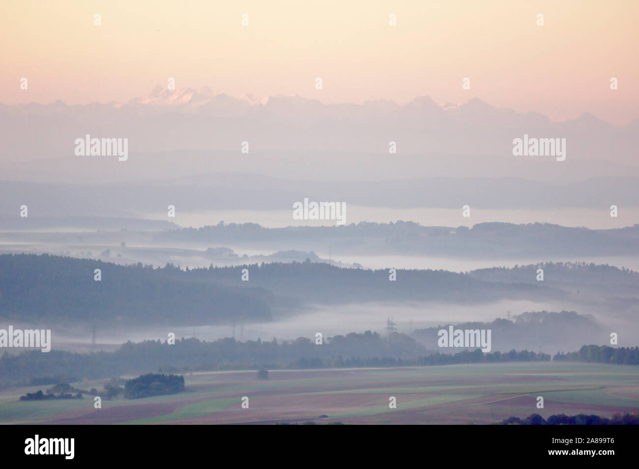 View from Buchberg near Blumberg towards the Alps, sunrise,  autumn, Black Forest, Germany Stock Photo
