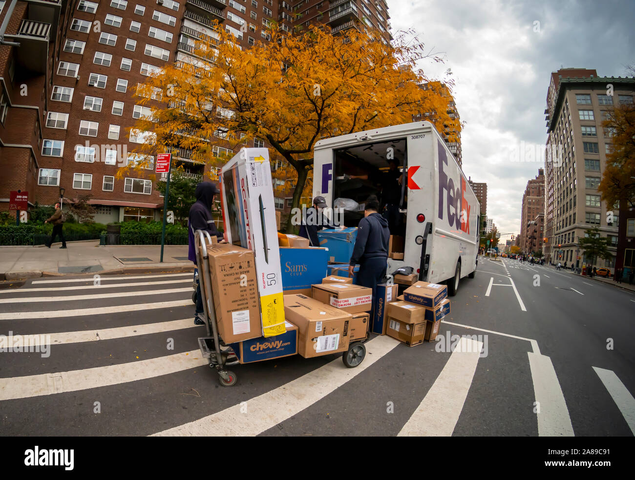 FedEx workers sort packages in Chelsea in New York on Tuesday, November 5, 2019. (© Richard B. Levine) Stock Photo