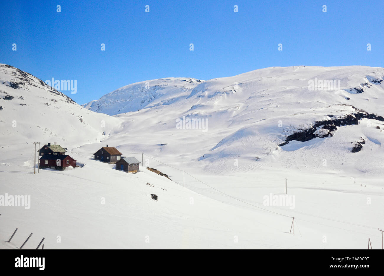 The snowy mountains at the Hardangervidda National Park. Norwayskyline Stock Photo