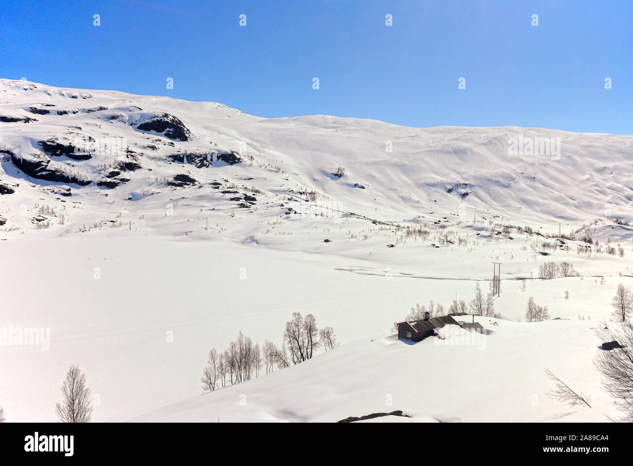 The snowy mountains at the Hardangervidda National Park. Norwayskyline Stock Photo