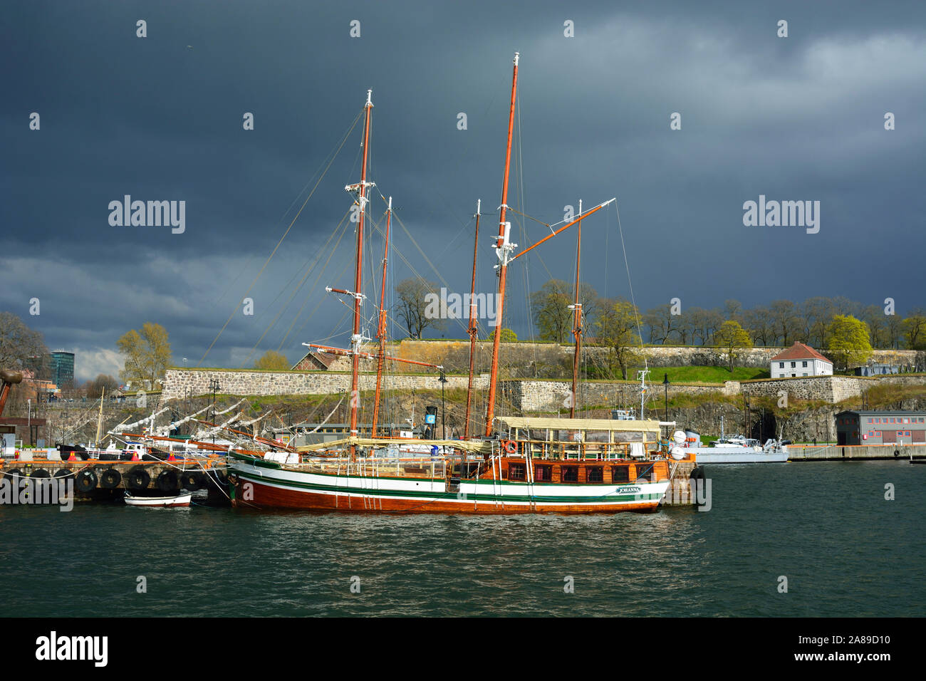 A sailing ship in the harbour near the Akershus Fortress. Oslo, Norway Stock Photo