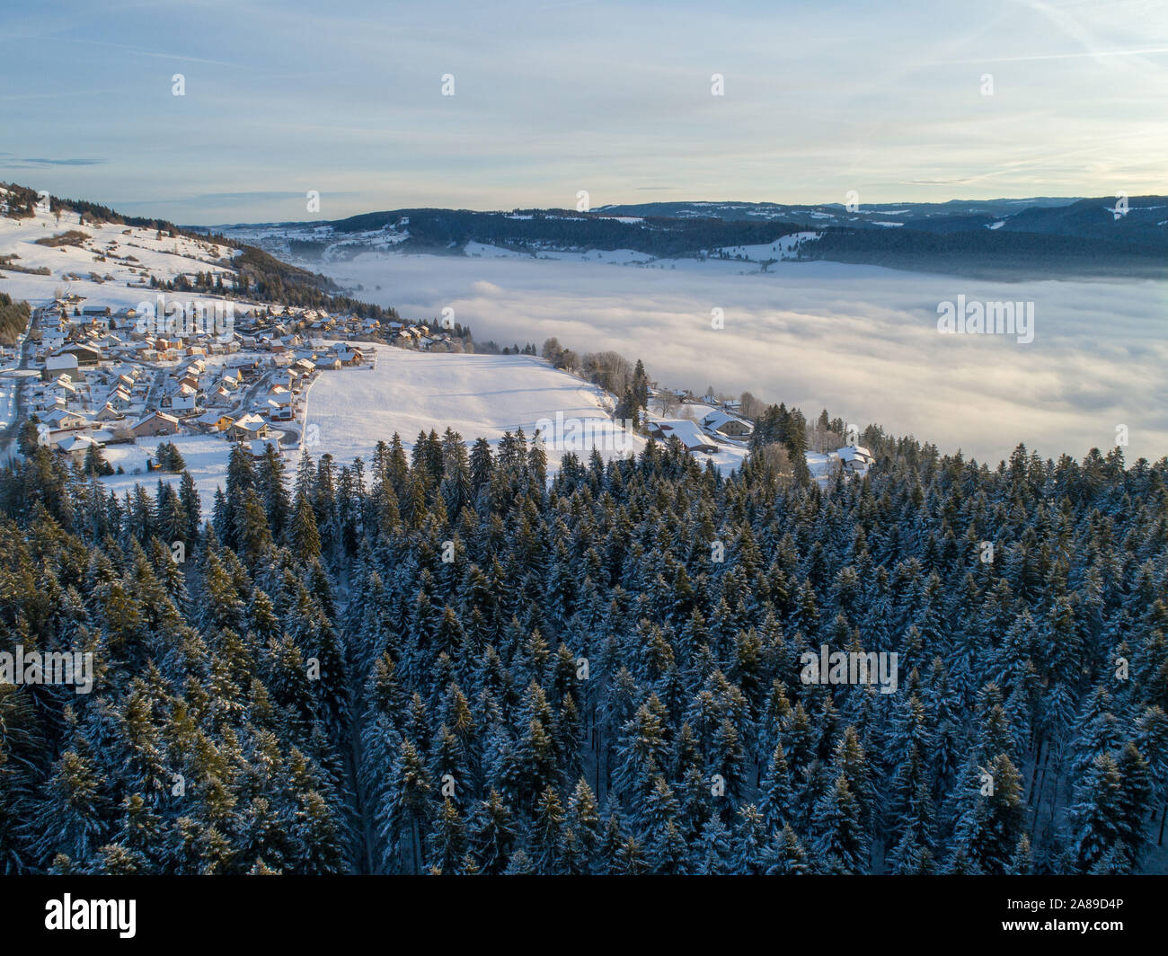 Aerial View Of Morteau In Winter, In The Jura Mountain Range. Forest ...