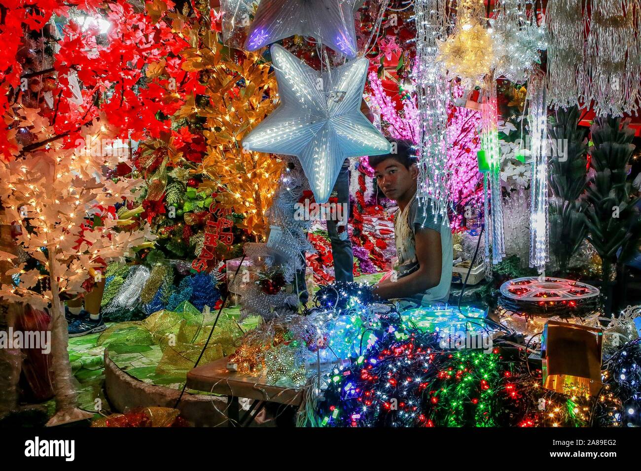 Quezon City, Philippines. 7th Nov, 2019. A shop owner sells ...