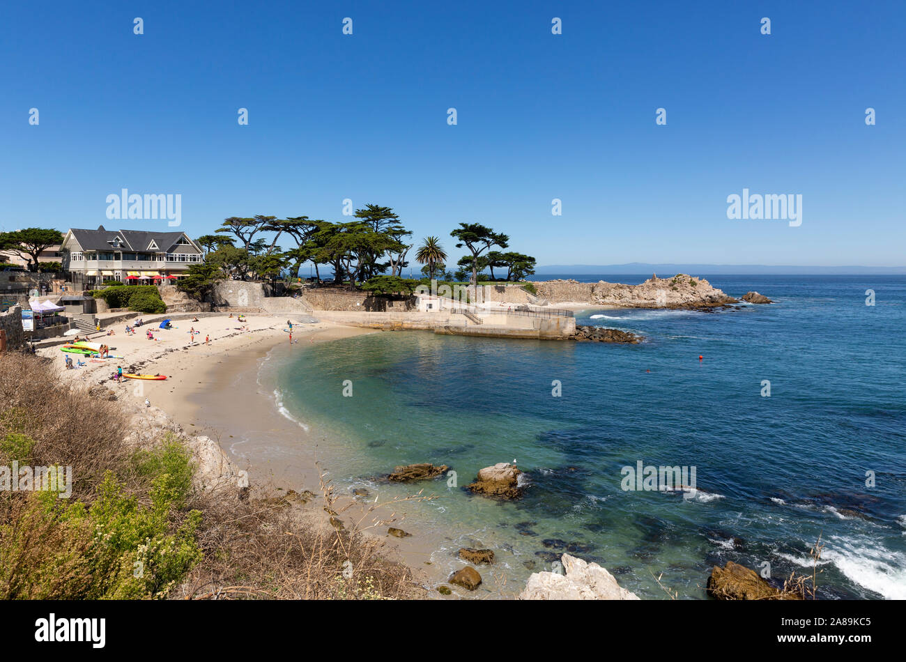 MONTEREY, USA - SEPTEMBER 24, 2019 : People enjoying a sunny day at Lover's Point beach on California's Central coast. Stock Photo