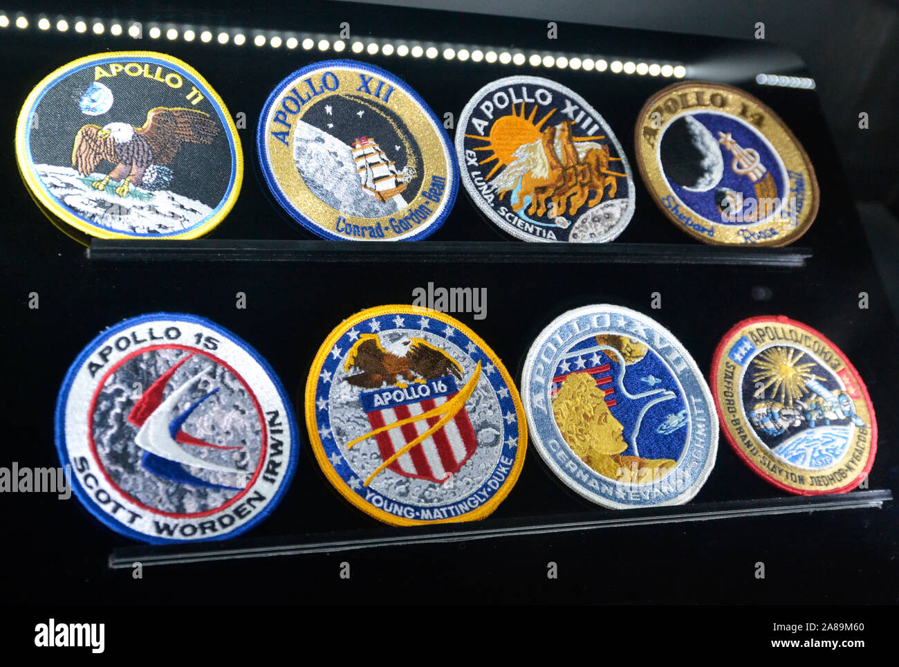 Astronaut's badges, marking Apollo Missions at the National Space Centre, Leicester, Leicestershire, UK Stock Photo