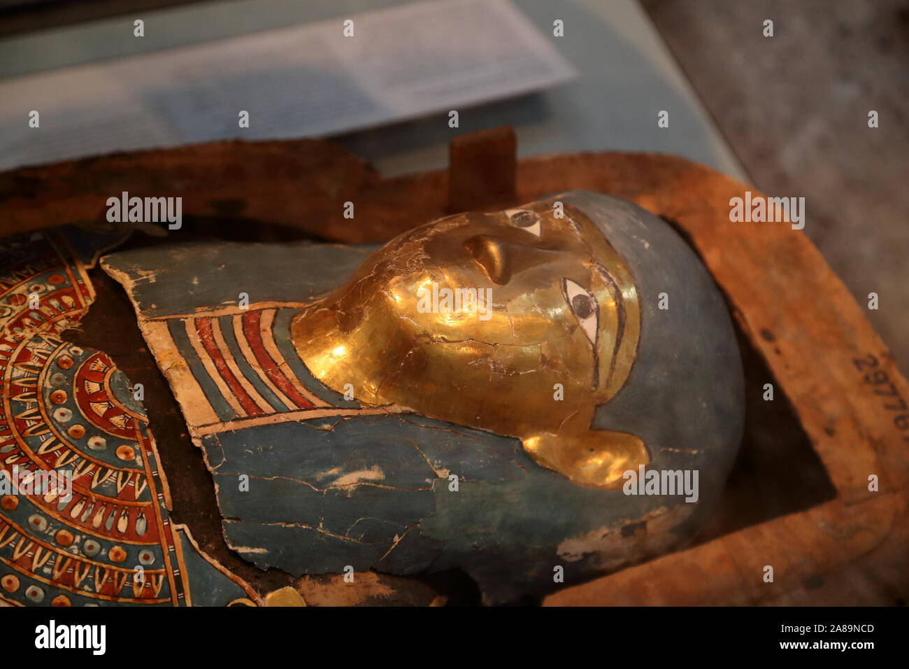 Painted wooden coffin and mummy of Djedhor at the British Museum in London, UK Stock Photo