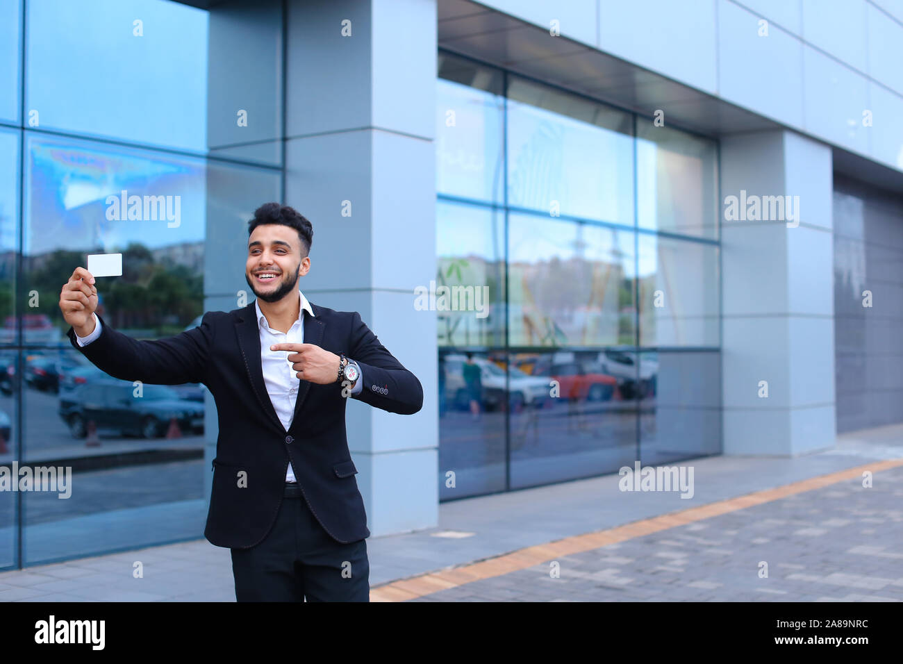 Young arabic man demonstrate hi-res stock photography and images - Alamy