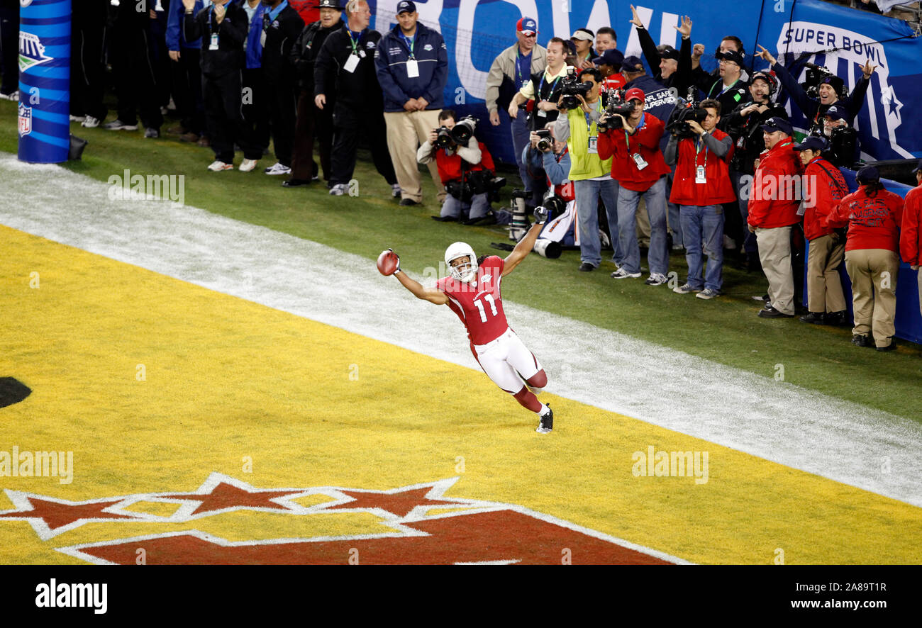 Wide Receiver Larry Fitzgerald celebrates a touchdown reception during the Arizona Cardinals Super Bowl XLIII game against the Pittsburgh Steelers at Raymond James Stadium in Tampa, Florida. The Steelers won 27-23. Stock Photo