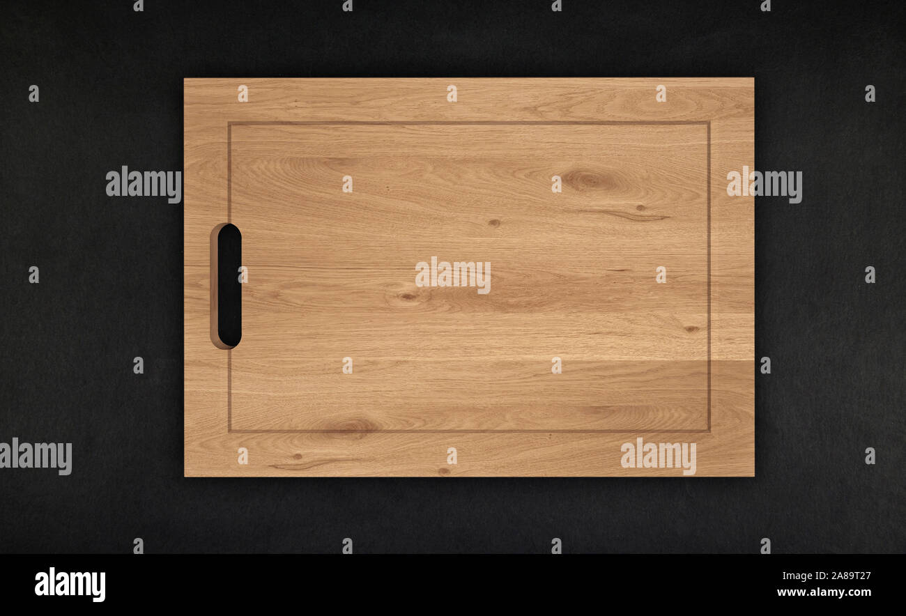 wood cutting board For Food on black background Stock Photo - Alamy