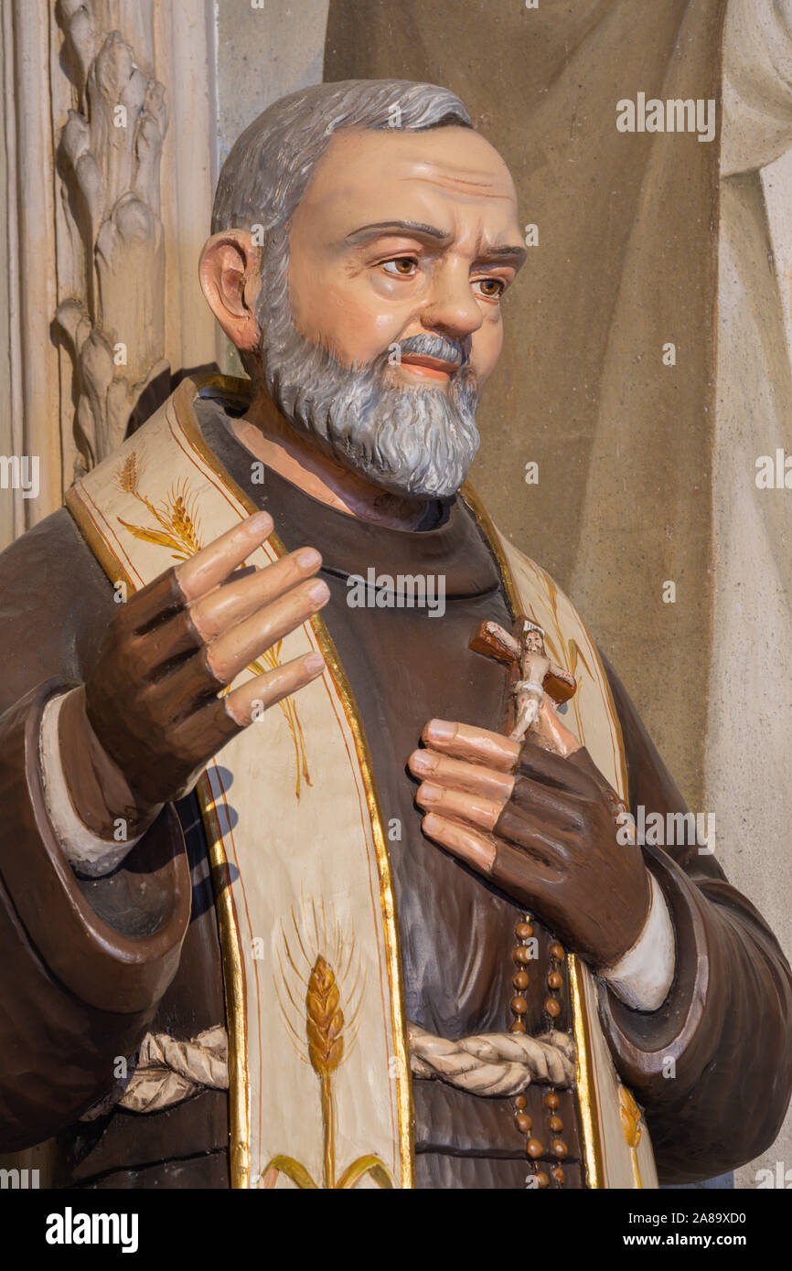 MENAGGIO, ITALY - MAY 8, 2015: The carved polychrome statue of Father Pio  in church Chiesa di Santa Marta Stock Photo - Alamy