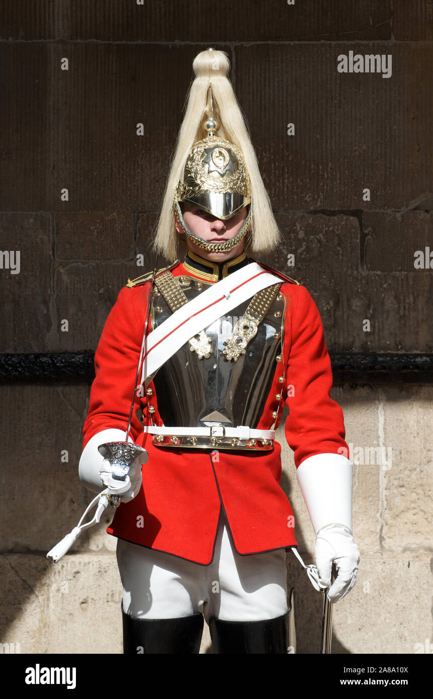 LONDON - SEPTEMBER 22, 2011: Dismounted horse guard sentry stands at Horse Guards Arch, Saint James's Palace, Whitehall, upheld since Tudor times. Stock Photo