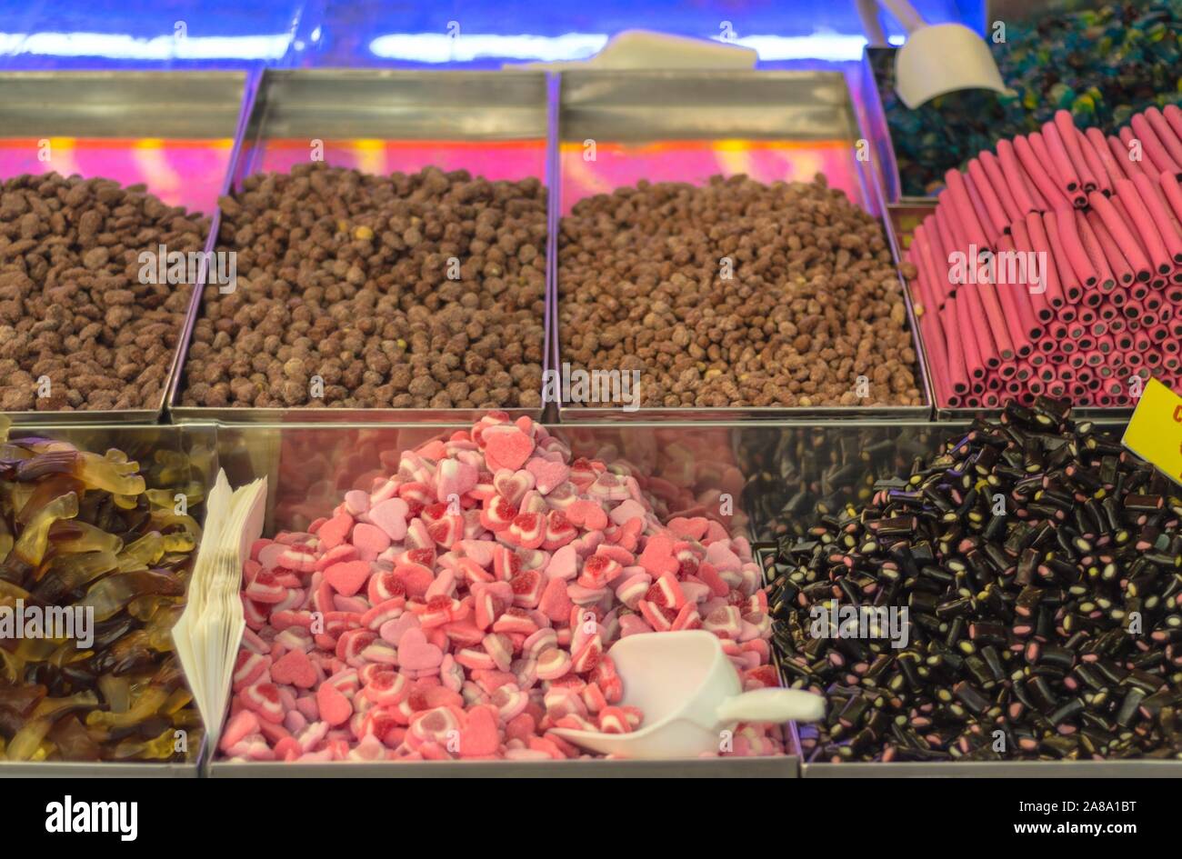 Display and sale of colored confectionery products Stock Photo Alamy