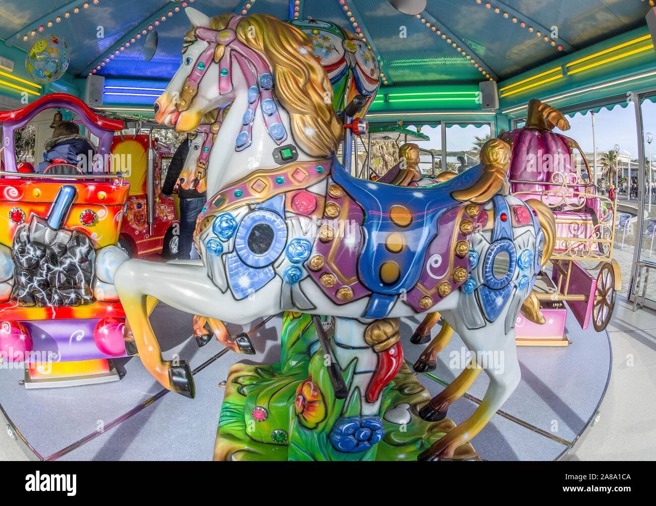 Colorful Carousel At The Amusement Park Stock Photo Alamy