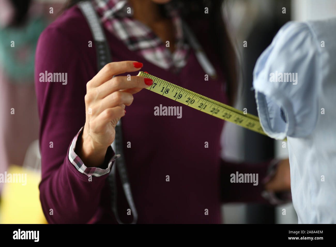 Female tailor at workplace Stock Photo