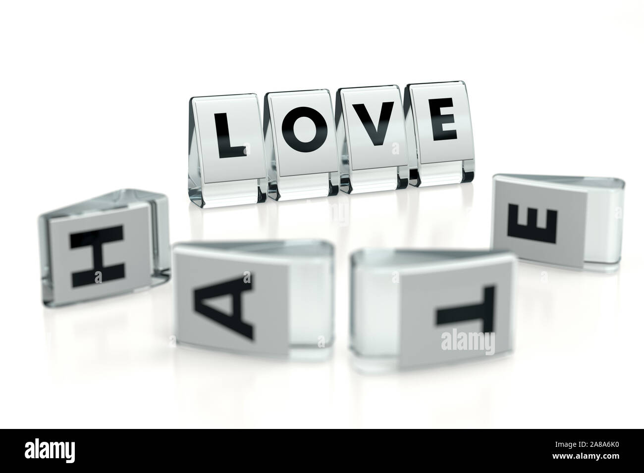 LOVE word written on glossy blocks and fallen over blurry blocks with HATE letters. Love wins, hate loses - concept. 3D rendering Stock Photo