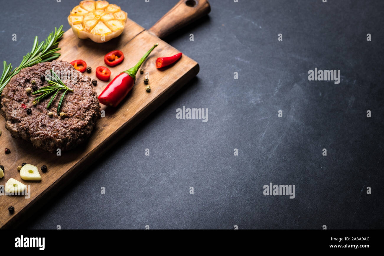 Beef burger cutlet with herbs and spices Stock Photo Alamy
