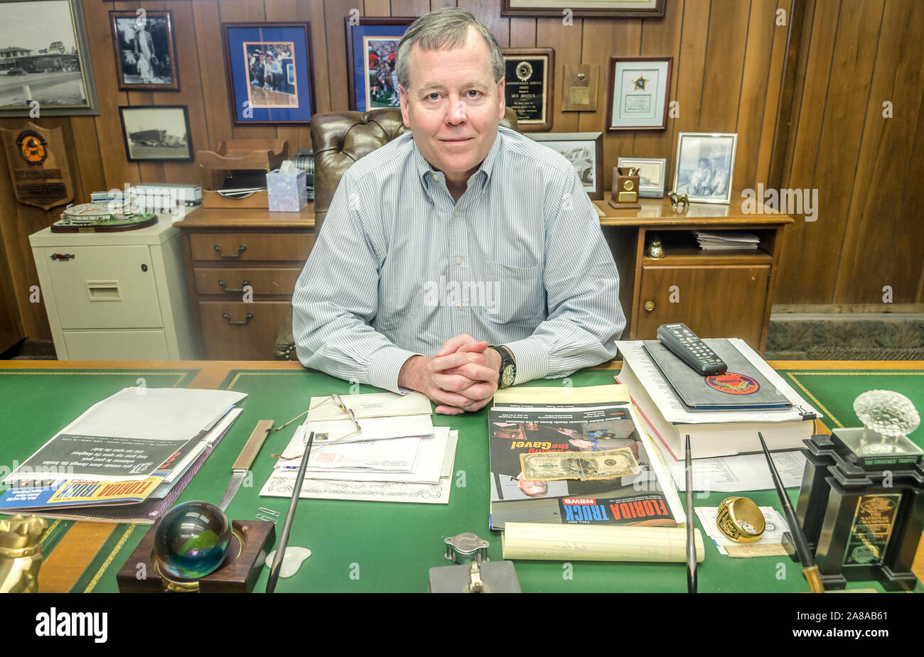 Mark Bostick, president of Comcar Industries, sits at his father’s desk, April 16, 2015, in Auburndale, Florida. Stock Photo