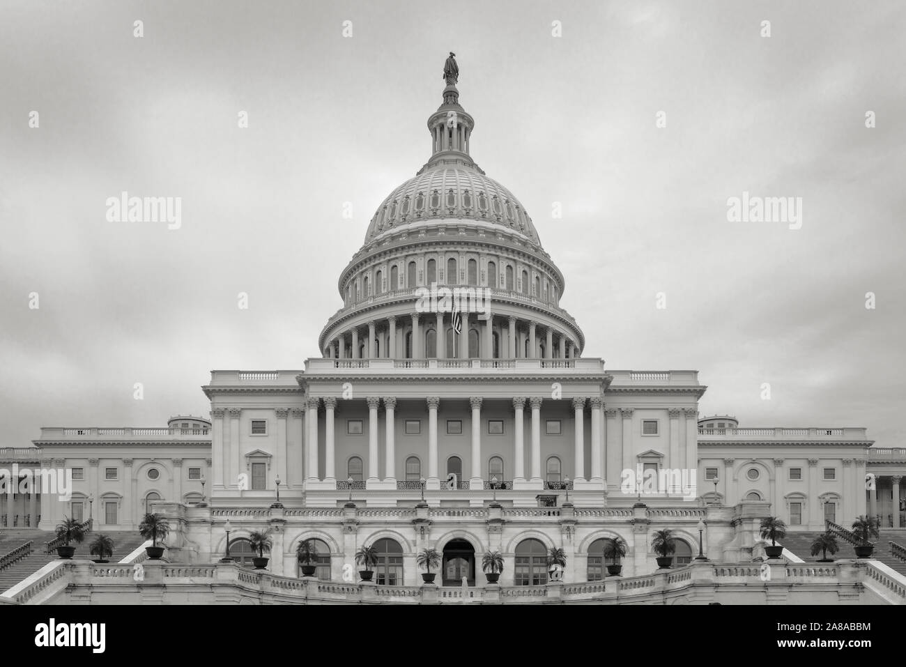 Western face of the US Capitol Building on a stormy day in black & white. Stock Photo