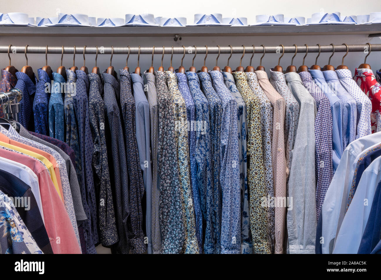 Shirts on hanger hi-res stock photography and images - Alamy