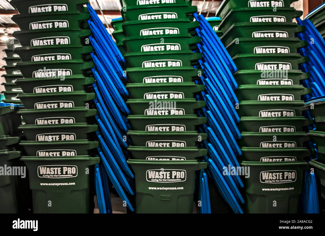 Residential trash cans are stacked at Waste Pro, March 18, 2016, in