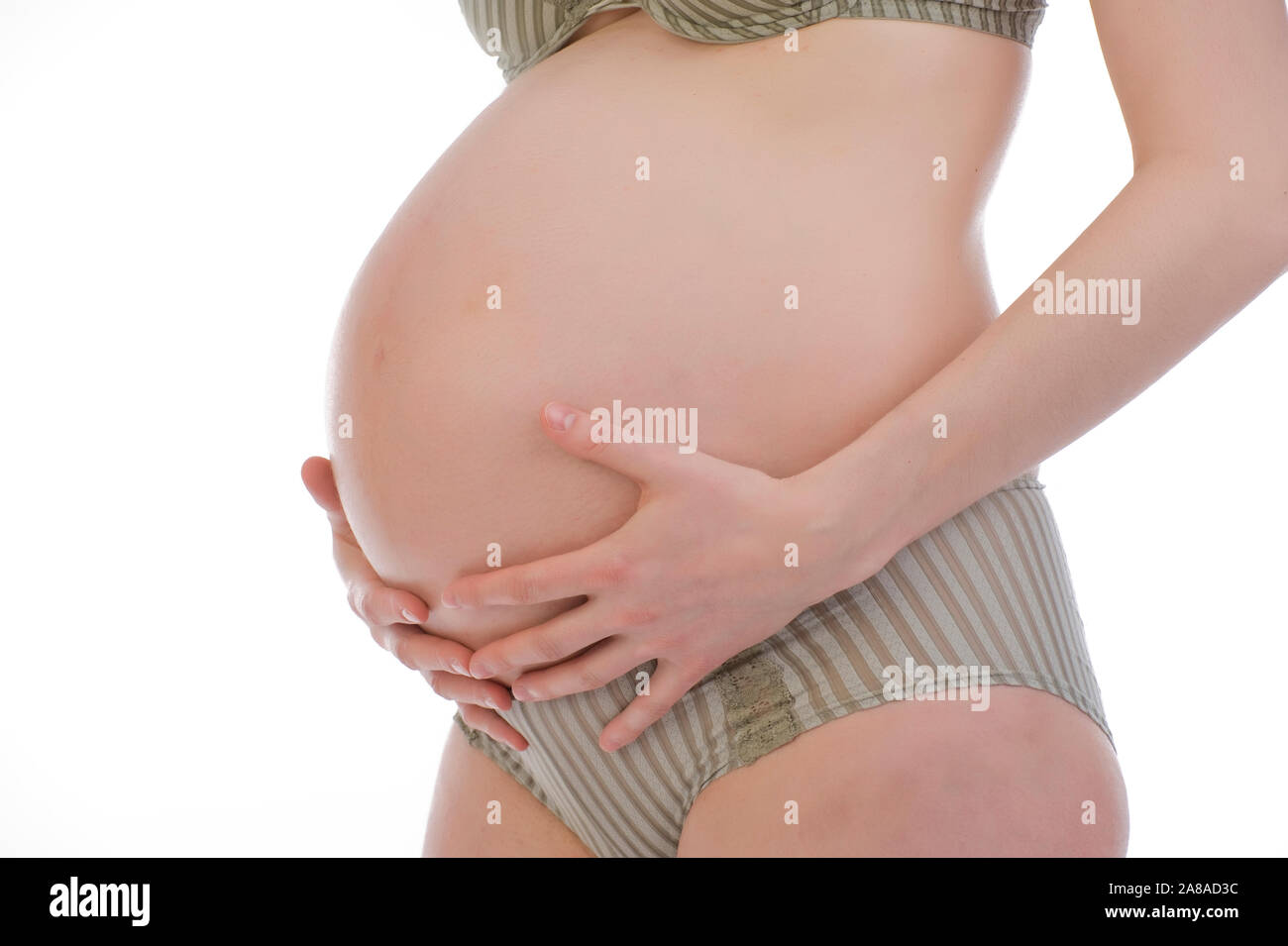Schwangere Frau zeigt ihren Bauch, 9. Monat, Schwanger, Stock Photo