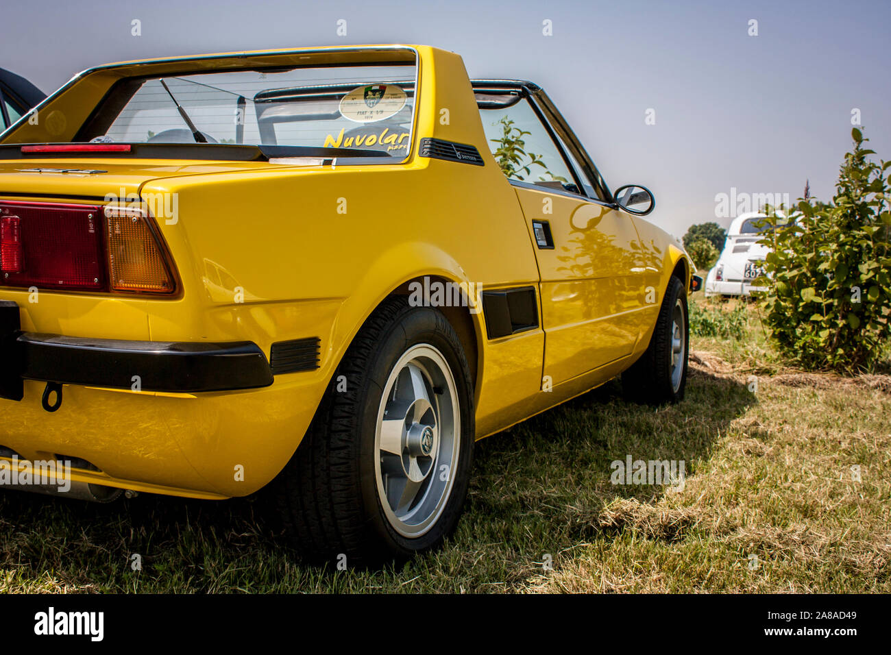 Old yellow sports car Stock Photo - Alamy