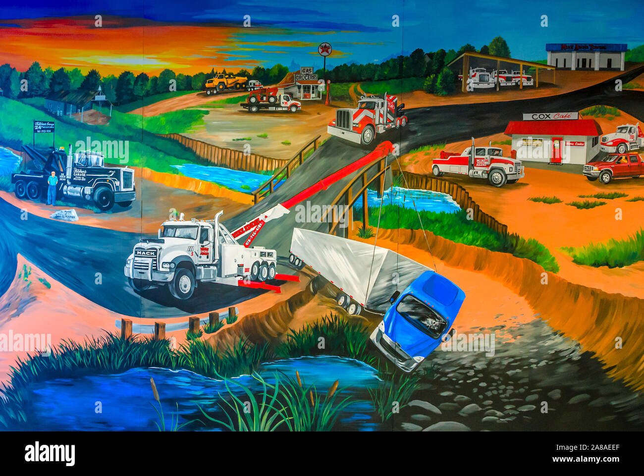 A mural, located on the wall at Mike Adams Towing and Air Cushion Recovery, depicts the life of the company, March 22, 2016, in Macon, Georgia. Stock Photo