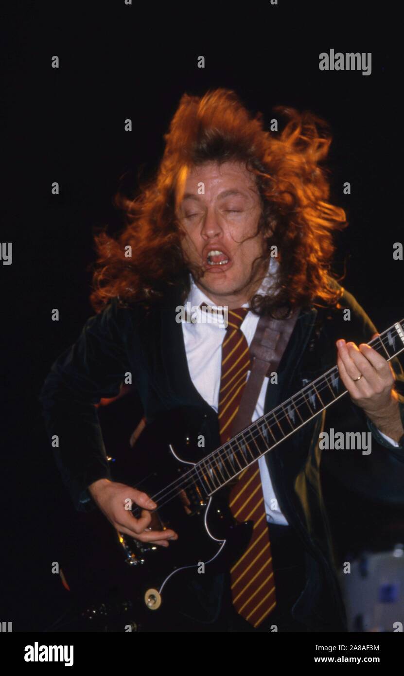 Australian heavy metal band AC/DC onn stage in London 1986: Angus Young Stock Photo
