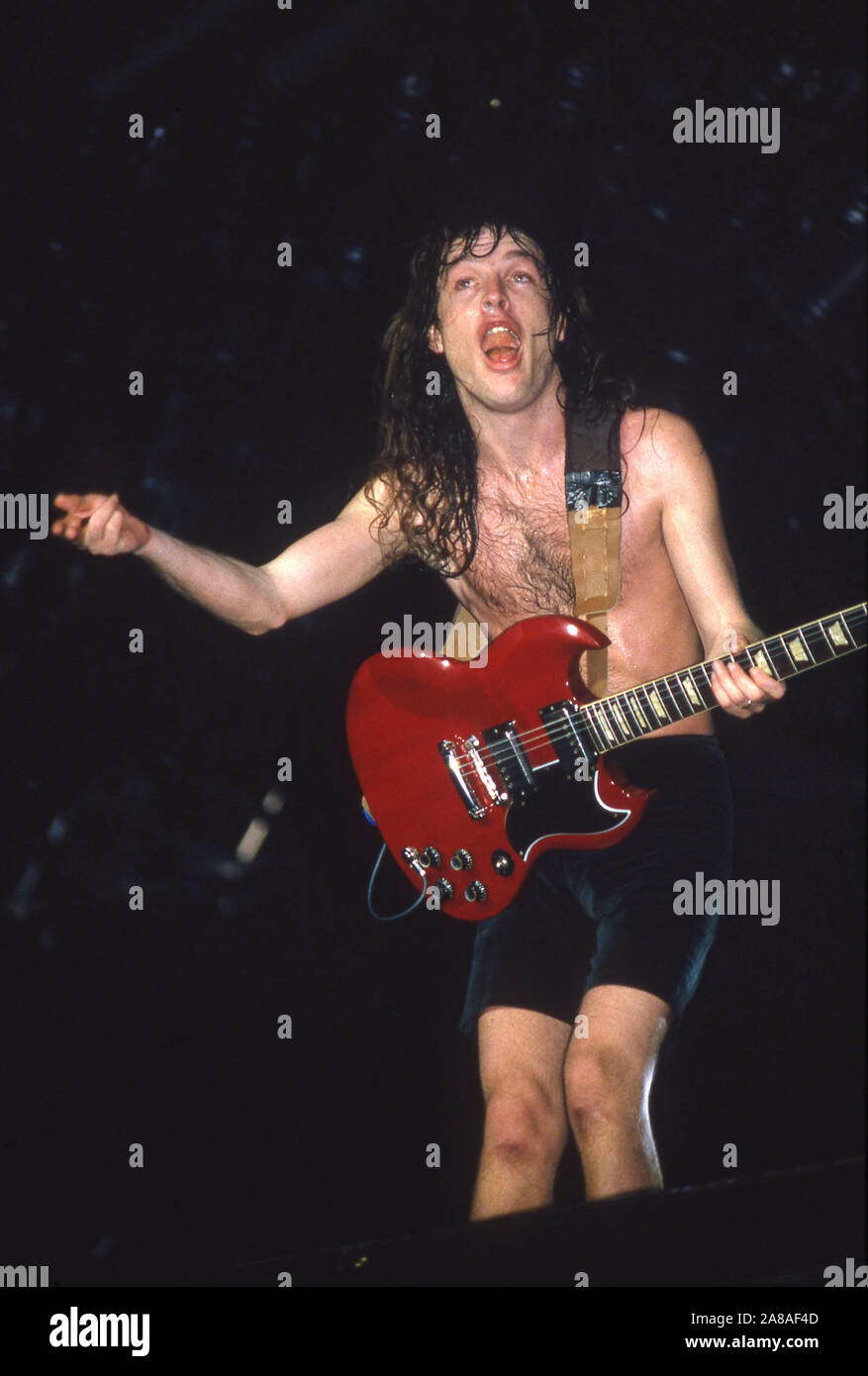 Australian heavy metal band AC/DC onn stage in London 1986 Angus Young Stock Photo Alamy
