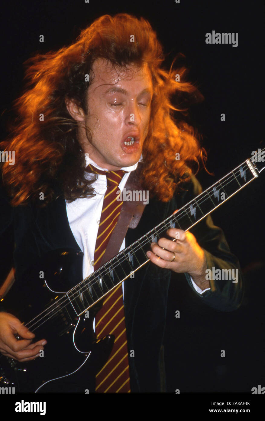 Australian heavy metal band AC/DC onn stage in London 1986 Angus Young Stock Photo Alamy