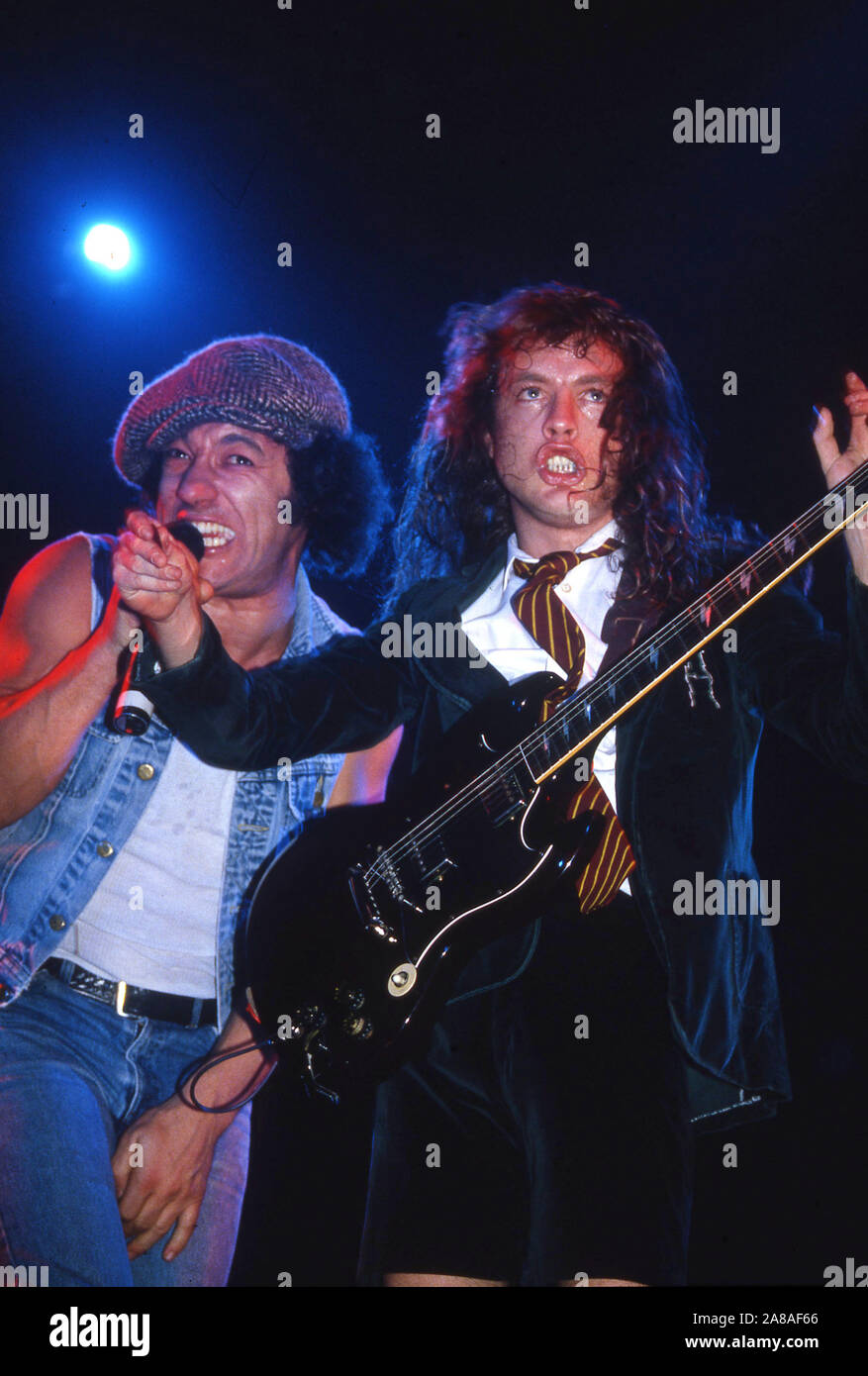 Australian heavy metal band AC/DC onn stage in London 1986: Brian Johnson and Angus Young Stock Photo