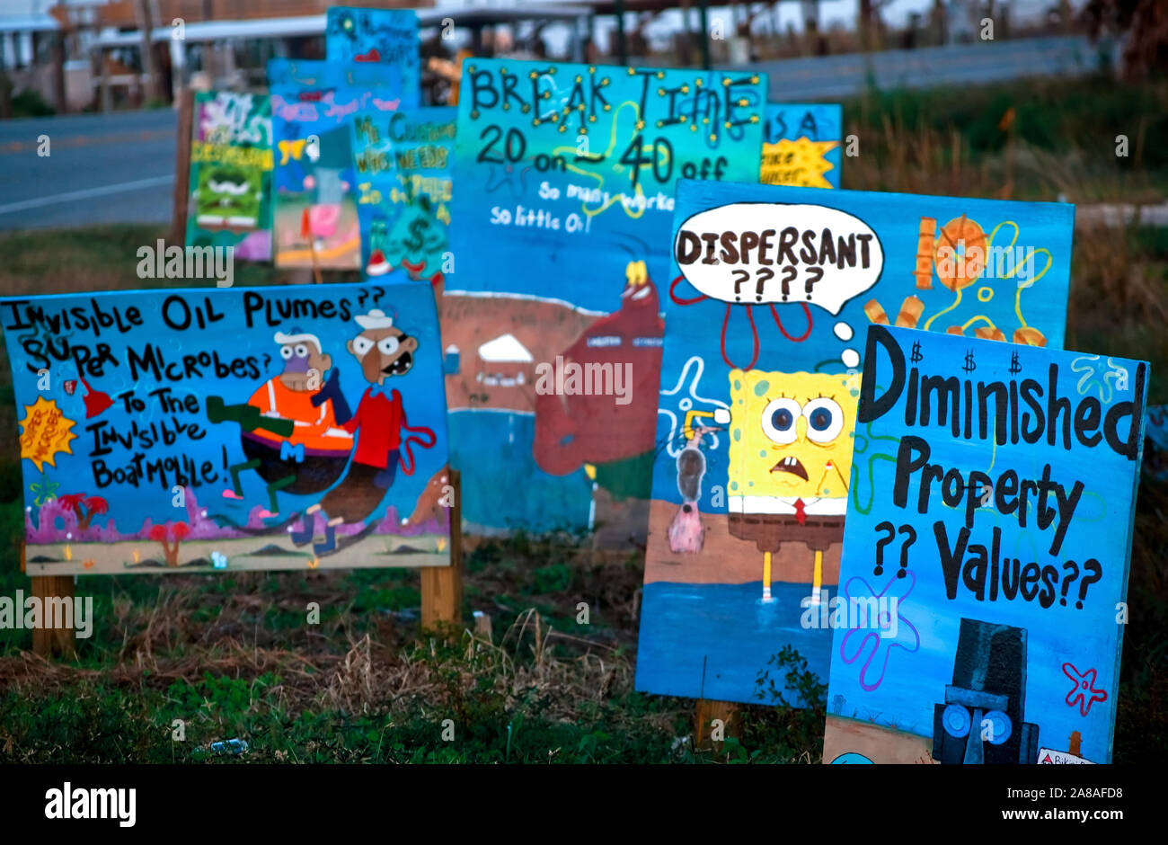 Hand-painted signs along Louisiana Highway 1 express Grand Isle residents' frustrations over the Deepwater Horizon BP oil spill Nov. 23, 2010. Stock Photo
