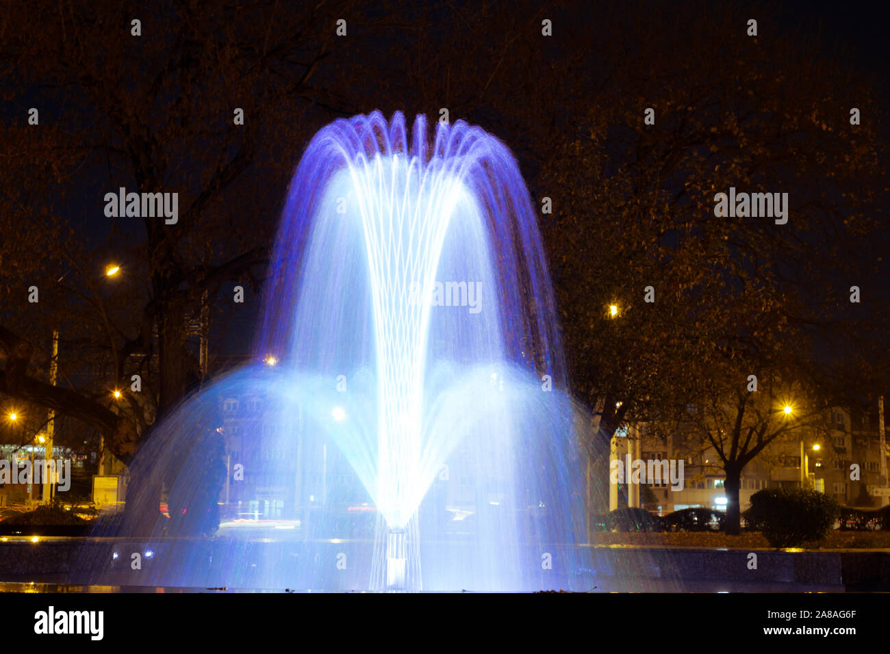 The colorful of fountain at night Stock Photo - Alamy