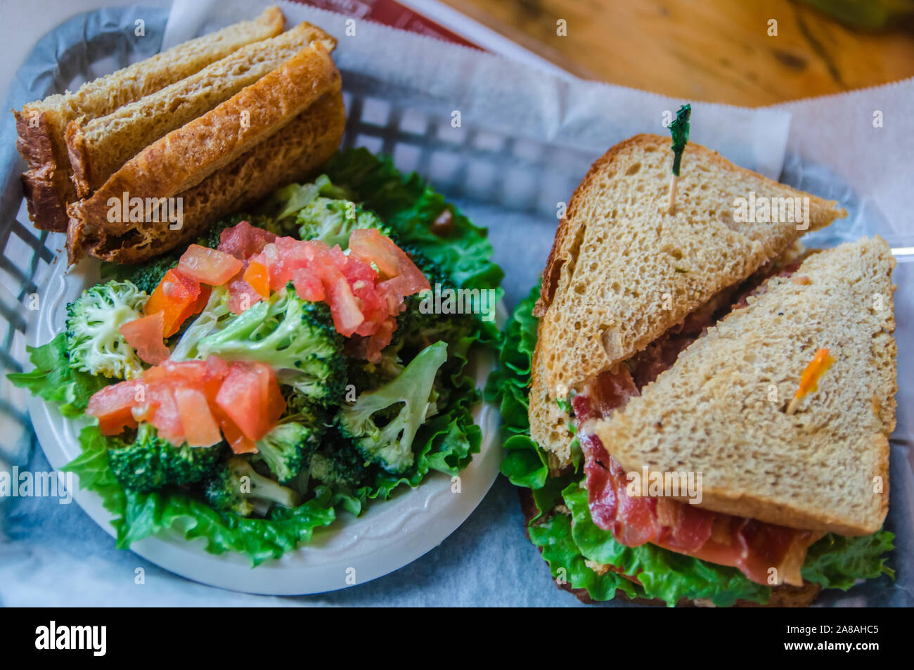 French Camp's Council House Café is known for its broccoli salad and 'Big Willie' BLT, which features 10 strips of bacon and spicy garlic mayonnaise. Stock Photo