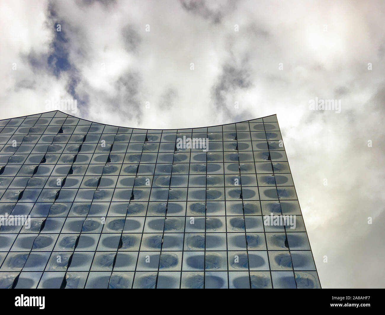 The wavy facade of the concert hall and hotell Elbphilharmonie in Hamburg, Germany Stock Photo