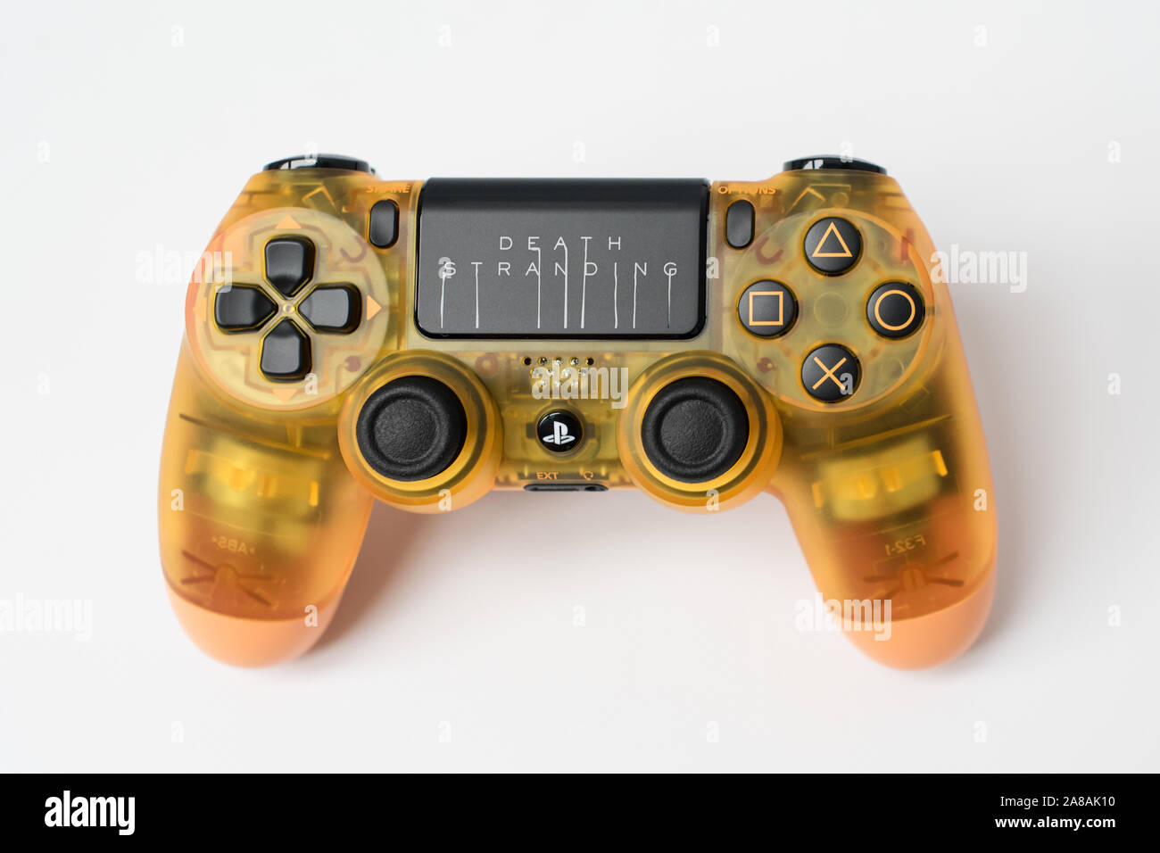 KIEV, UKRAINE - November 07, 2019: Death Stranding Limited Edition PS4 Pro.  Transparent dualshock controller for PlayStation 4 on white background  Stock Photo - Alamy