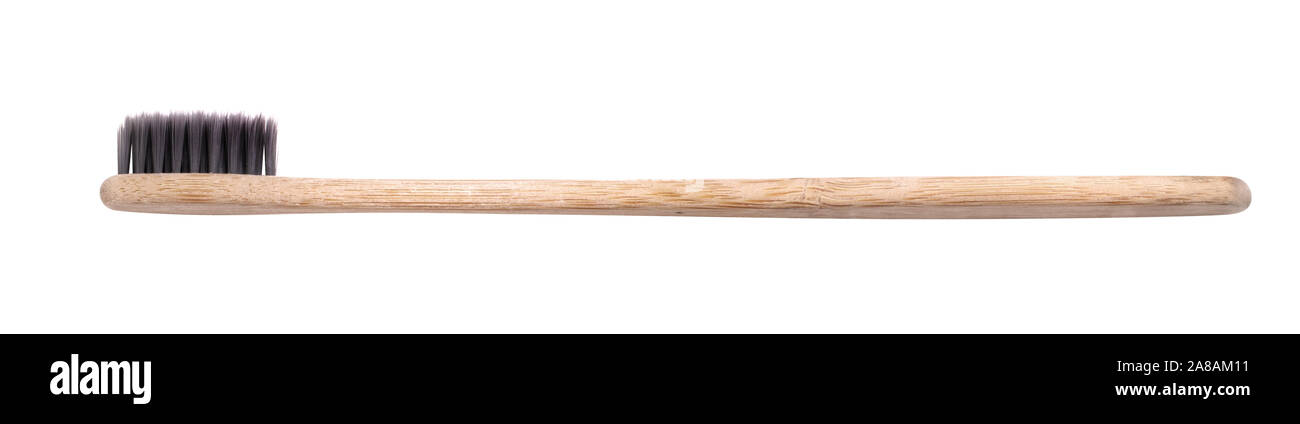 Natural wooden toothbrush isolated on white background Stock Photo - Alamy